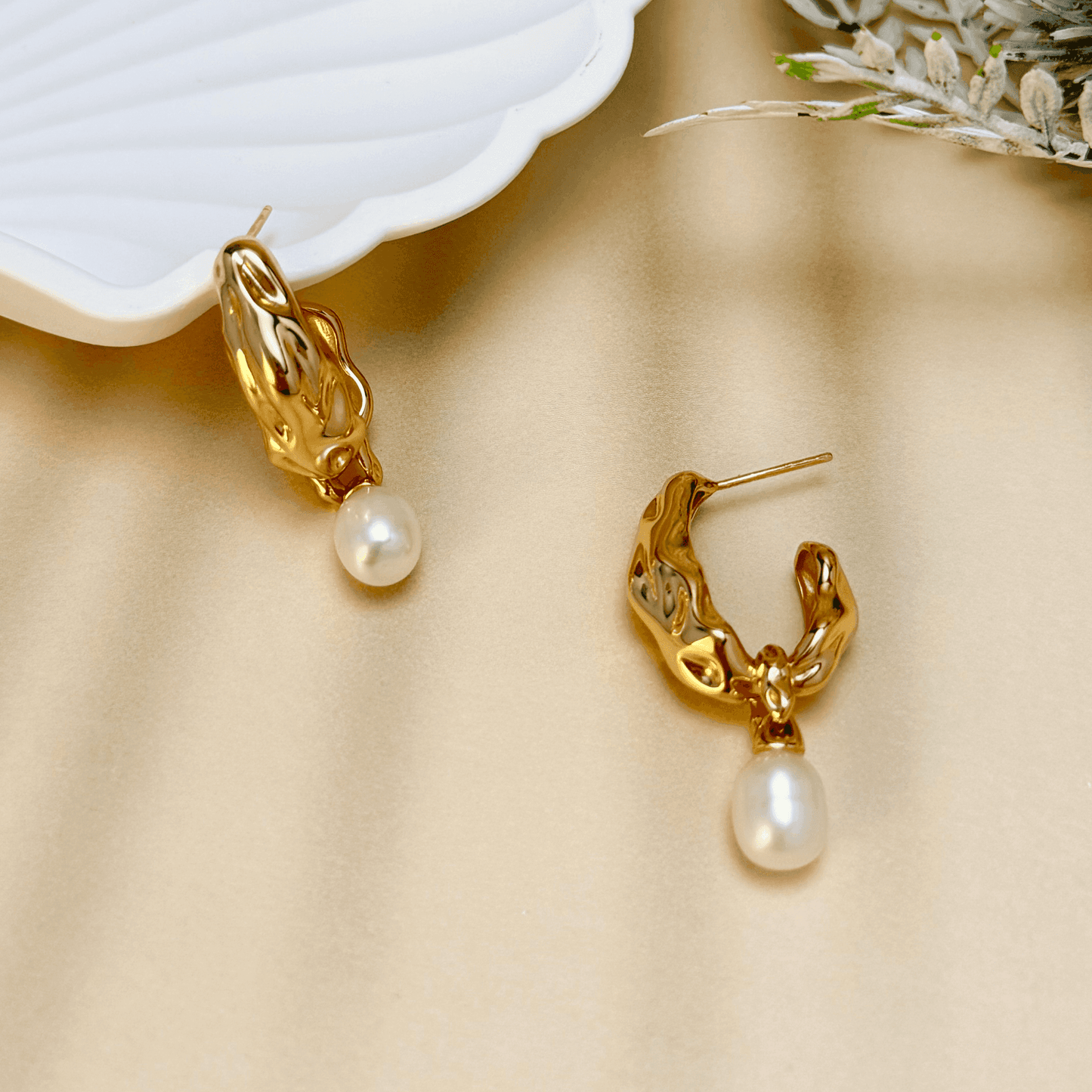 Elegant gold-plated freshwater pearl drop earrings with vintage molten texture, crafted in 925 sterling silver for a timeless, sophisticated look.