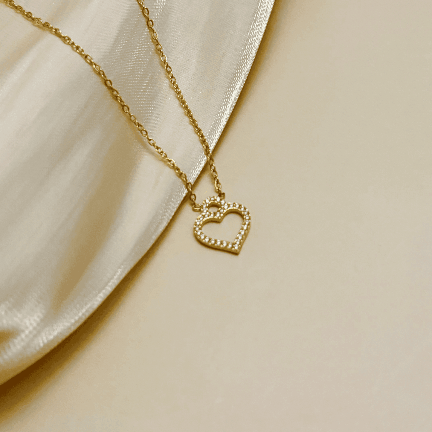 Gold-plated stainless steel heart necklace with zircon accents, dainty and waterproof