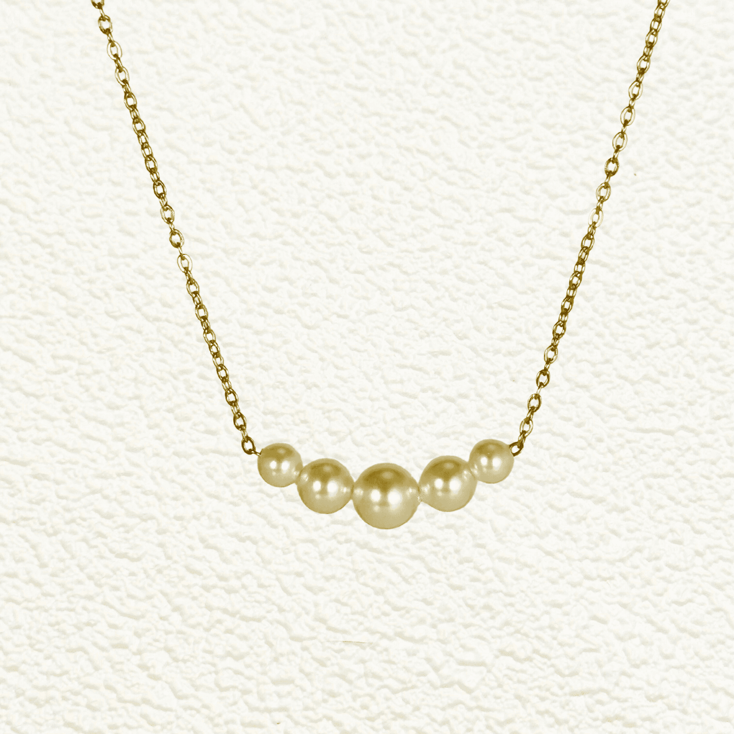 Graduated Swarovski crystal pearl necklace on gold or silver stainless steel chain – modern minimalist jewelry from MXW Jewellery