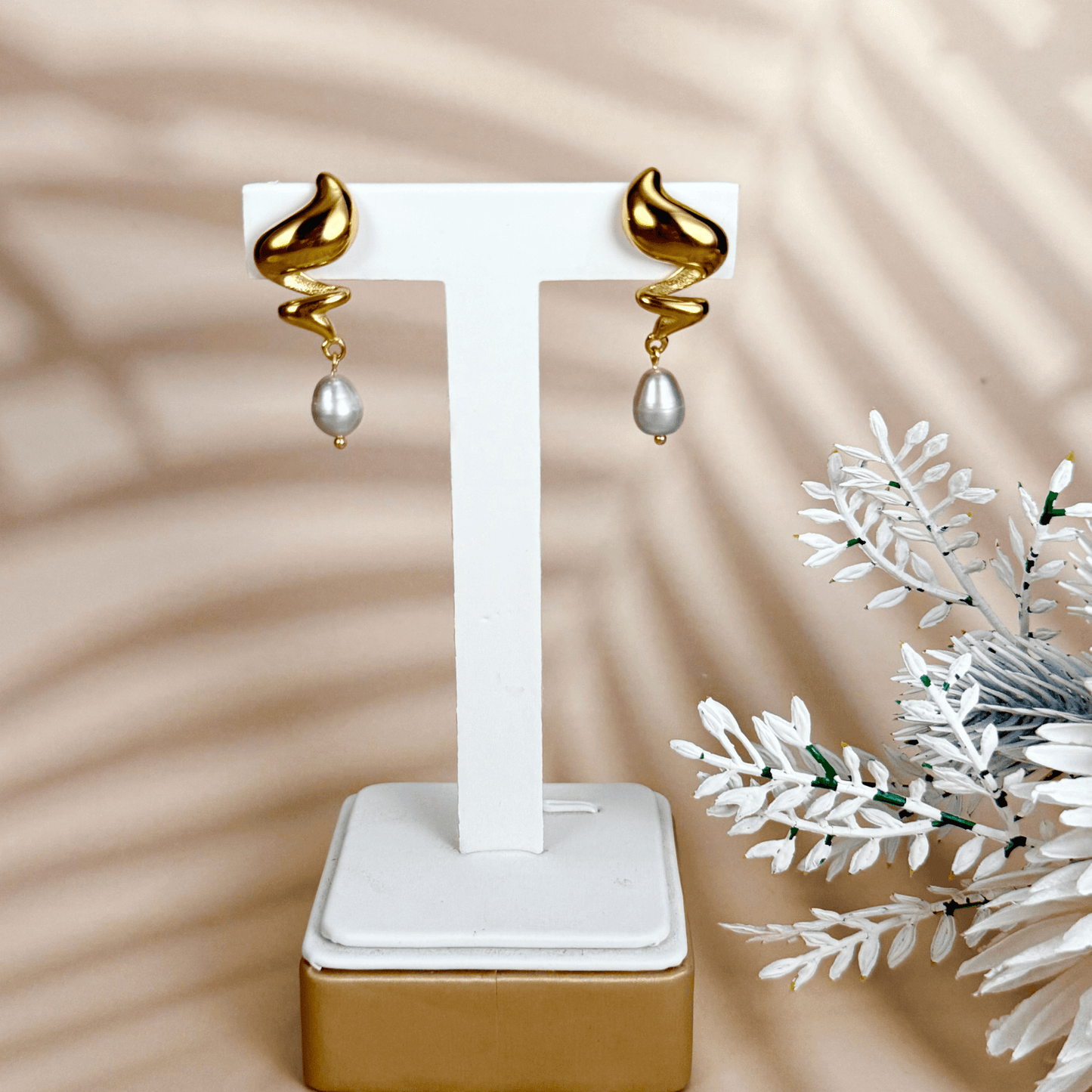 Gold sculptural twist earrings with grey freshwater pearls, modern waterproof PVD gold pearl drop earrings