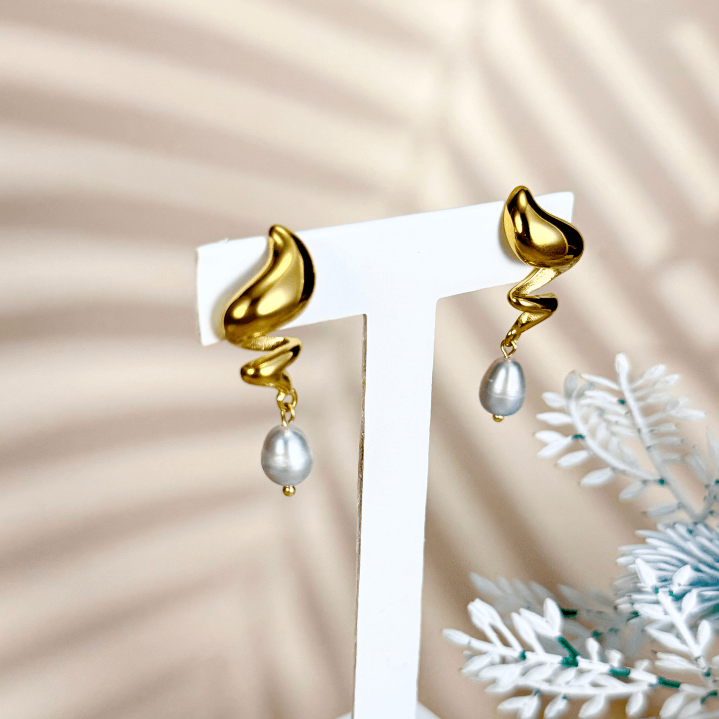 Gold sculptural twist earrings with grey freshwater pearls, modern waterproof PVD gold pearl drop earrings