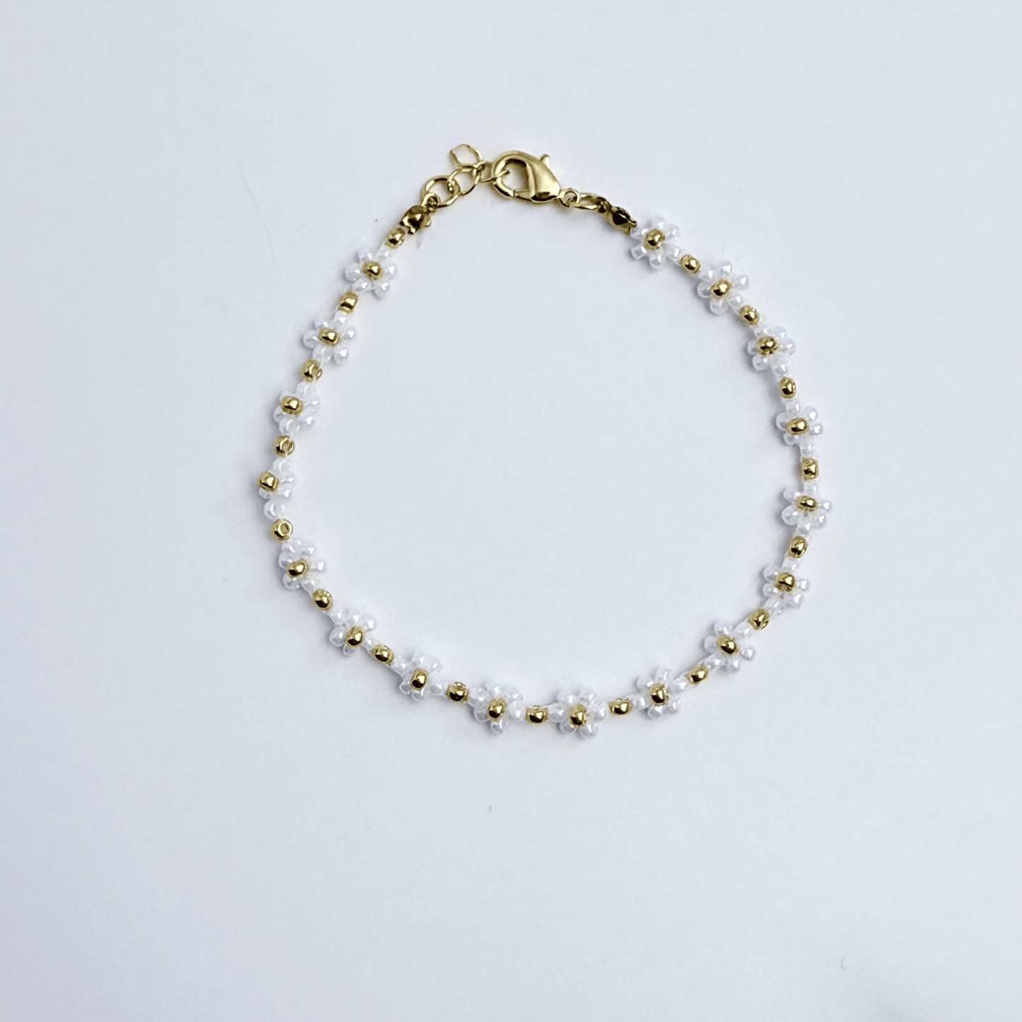 Handmade white daisy flower beaded bracelet with Japanese 2 mm seed beads and gold or silver accents
