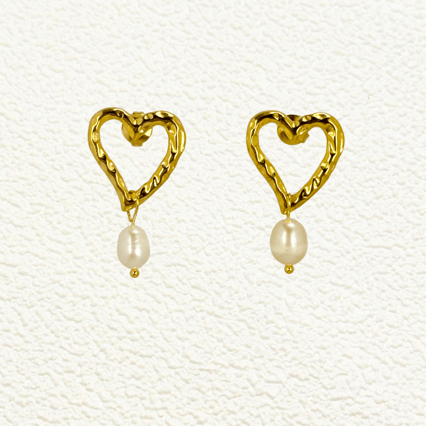 Gold hammered open-heart earrings with natural freshwater pearl drops, made from PVD gold plated stainless steel
