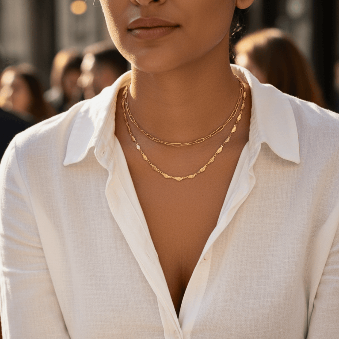 Elegant waterproof gold chain featuring textured leaf links with a minimalist, nature-inspired design