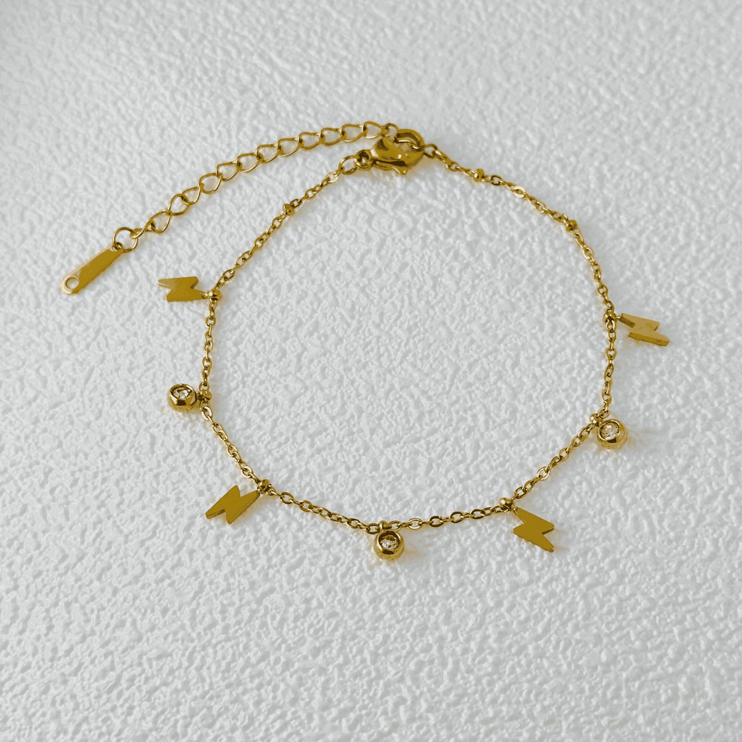Lightning Bolt & Zircon Gold Bracelet – waterproof gold-plated stainless steel with zircon stones and lightning bolt charms