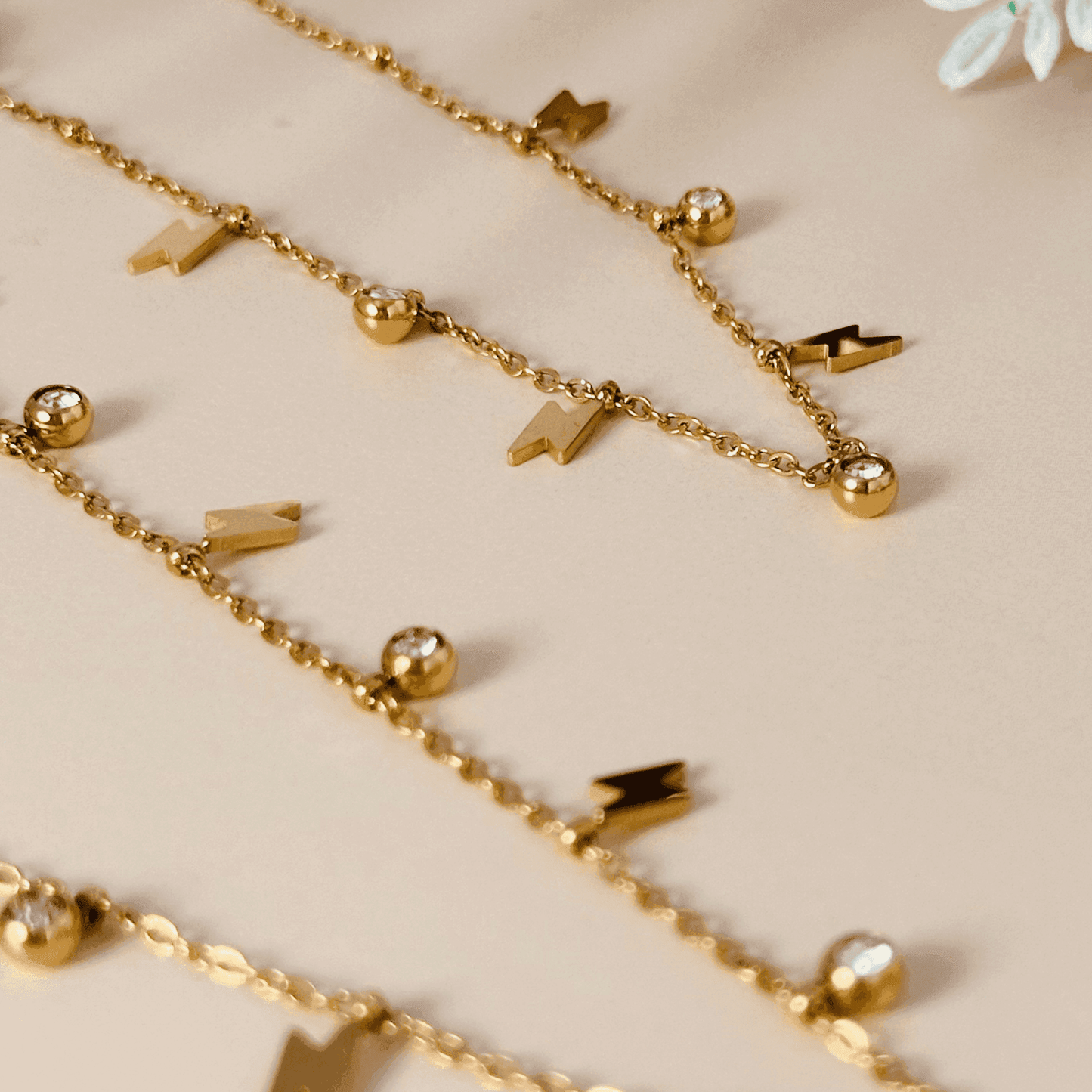 Lightning Bolt & Zircon Gold Necklace or Bracelet – waterproof gold-plated stainless steel with zircon stones and lightning bolt charms
