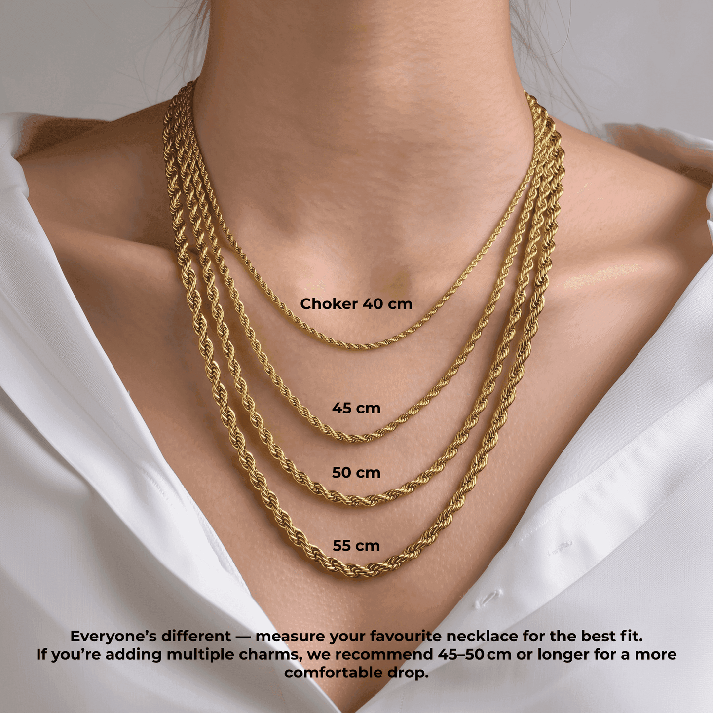 Woman wearing gold necklaces in 40 cm, 45 cm, 50 cm, and 55 cm lengths; MXW Jewellery chain length guide.