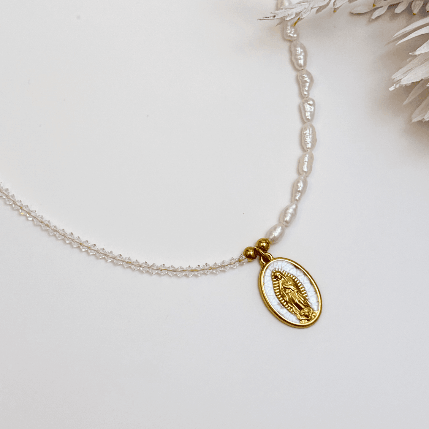 Our Lady charm necklace handcrafted with keshi pearls and Swarovski crystals – elegant, meaningful, and waterproof.