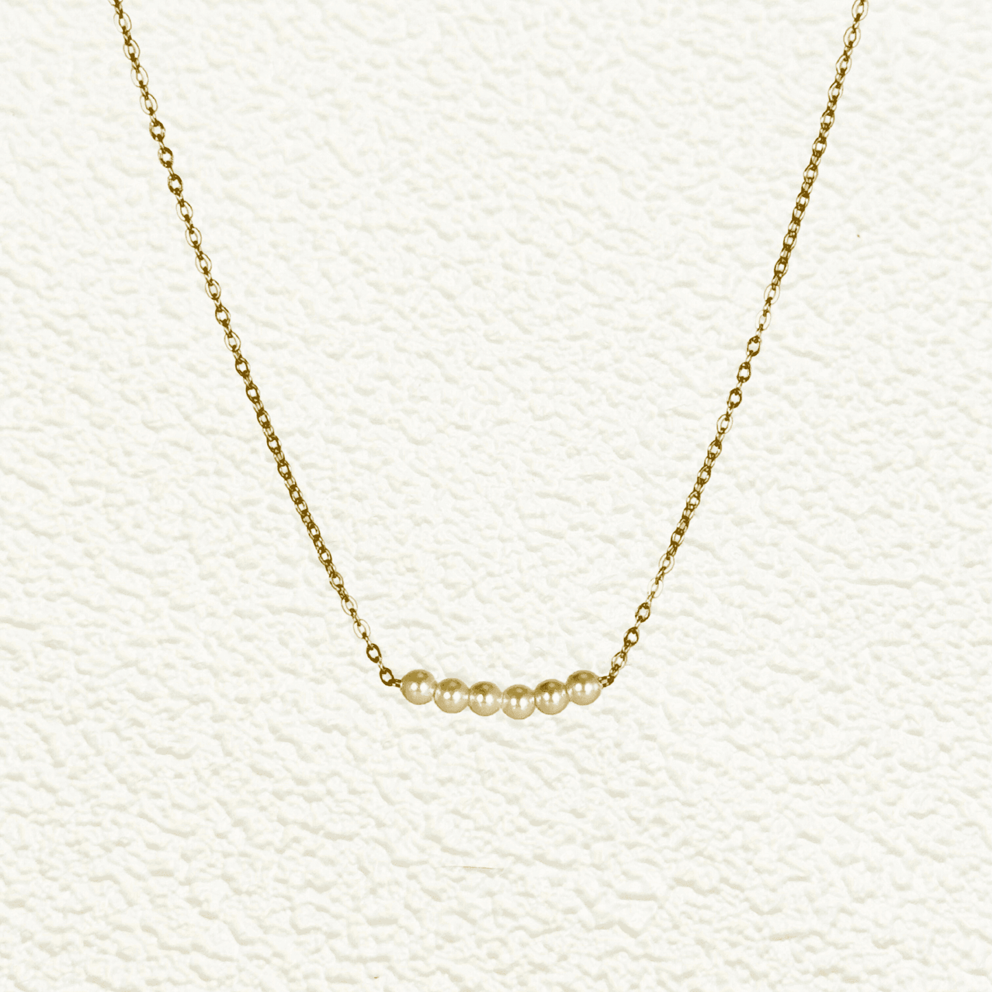 Minimalist necklace with petite 3mm Swarovski crystal pearl bar on gold and silver chains – elegant everyday jewellery