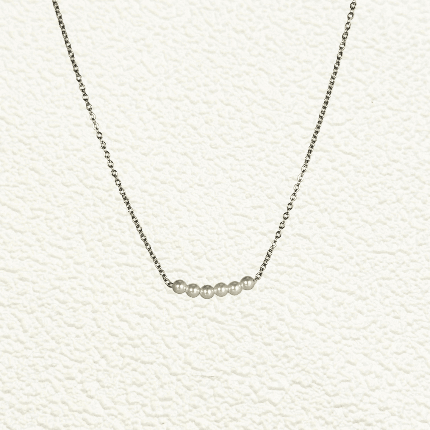 Minimalist necklace with petite 3mm Swarovski crystal pearl bar on gold and silver chains – elegant everyday jewellery
