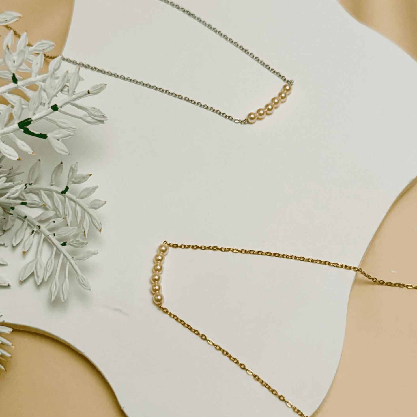 Minimalist necklace with petite 3mm Swarovski crystal pearl bar on gold and silver chains – elegant everyday jewellery