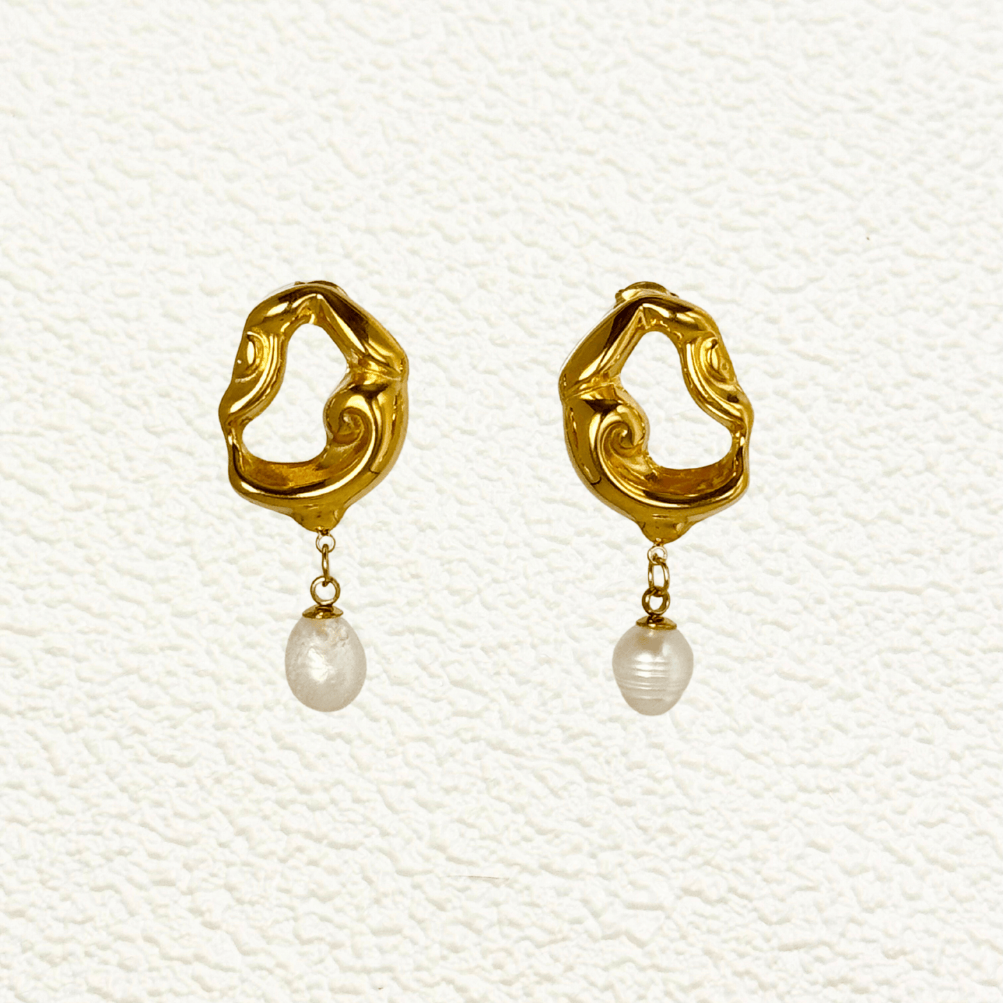 Sculpted gold and silver wave earrings with natural freshwater pearl drops – waterproof, tarnish-resistant minimalist jewellery by MXW Jewellery