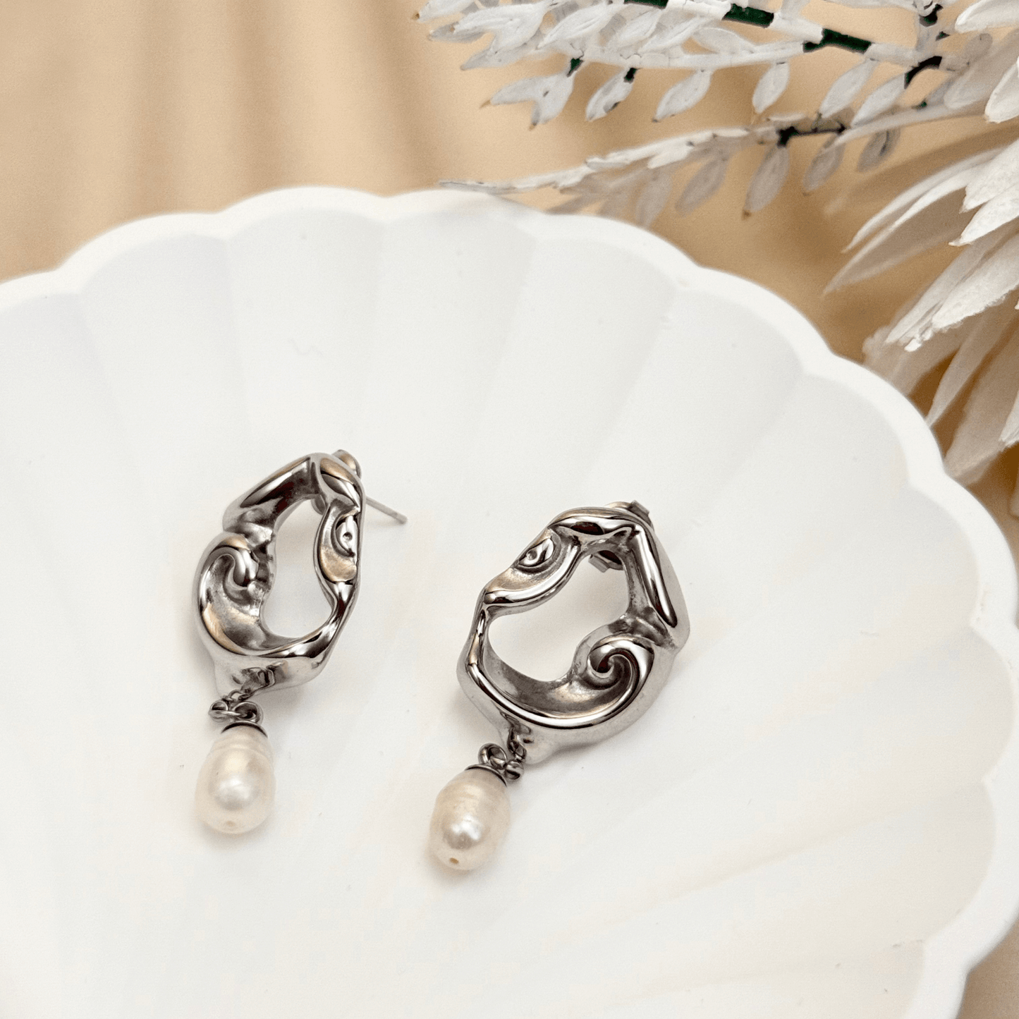 Sculpted gold and silver wave earrings with natural freshwater pearl drops – waterproof, tarnish-resistant minimalist jewellery by MXW Jewellery