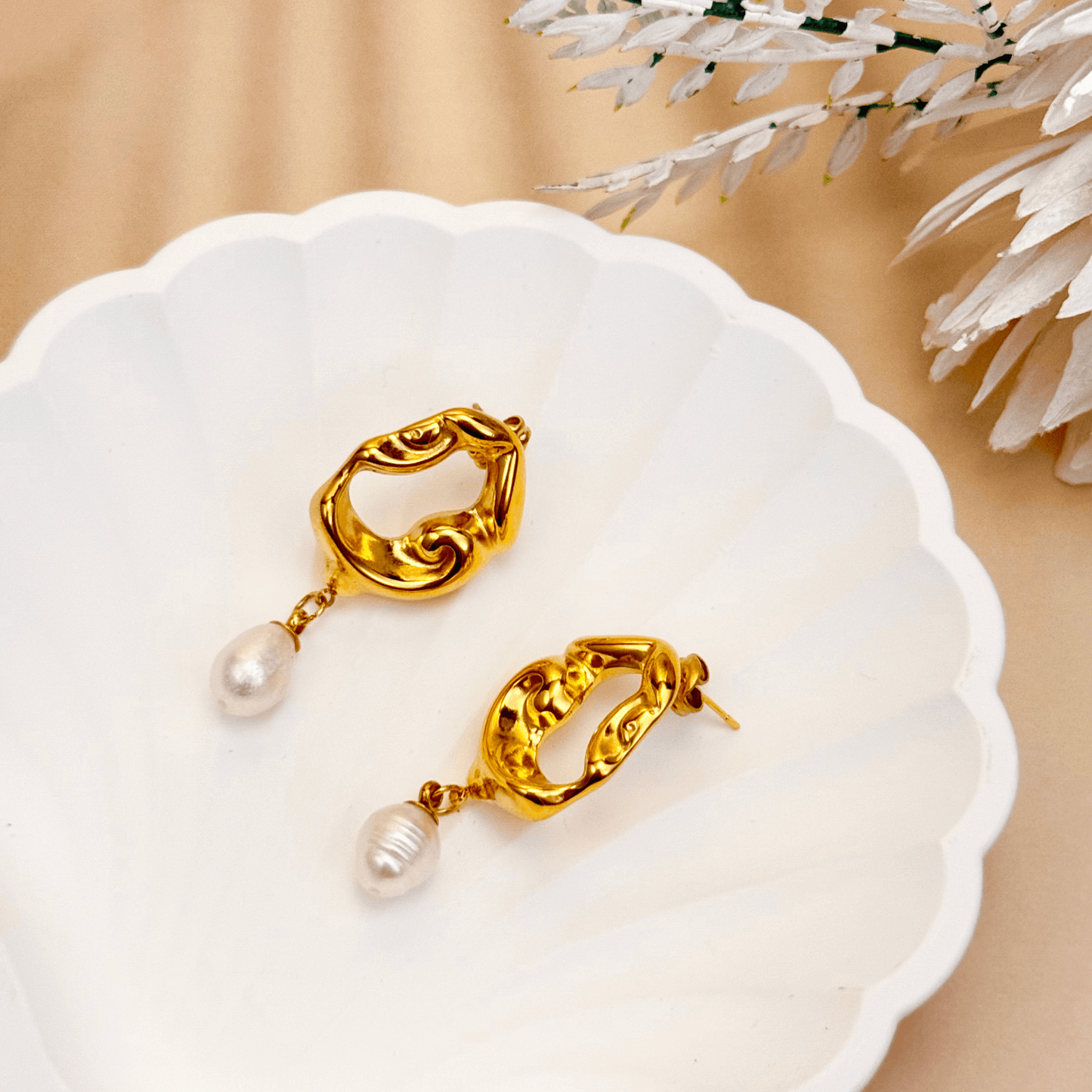 Sculpted gold and silver wave earrings with natural freshwater pearl drops – waterproof, tarnish-resistant minimalist jewellery by MXW Jewellery