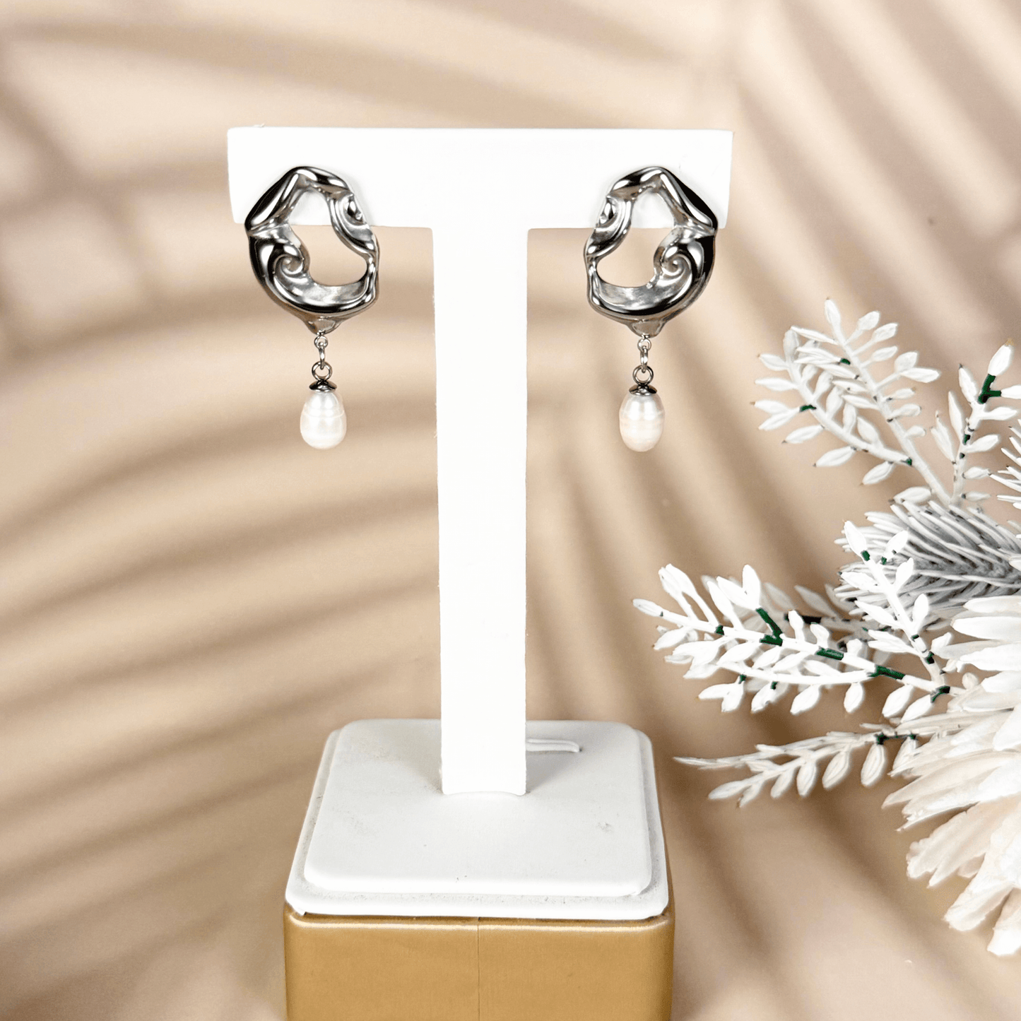 Sculpted gold and silver wave earrings with natural freshwater pearl drops – waterproof, tarnish-resistant minimalist jewellery by MXW Jewellery