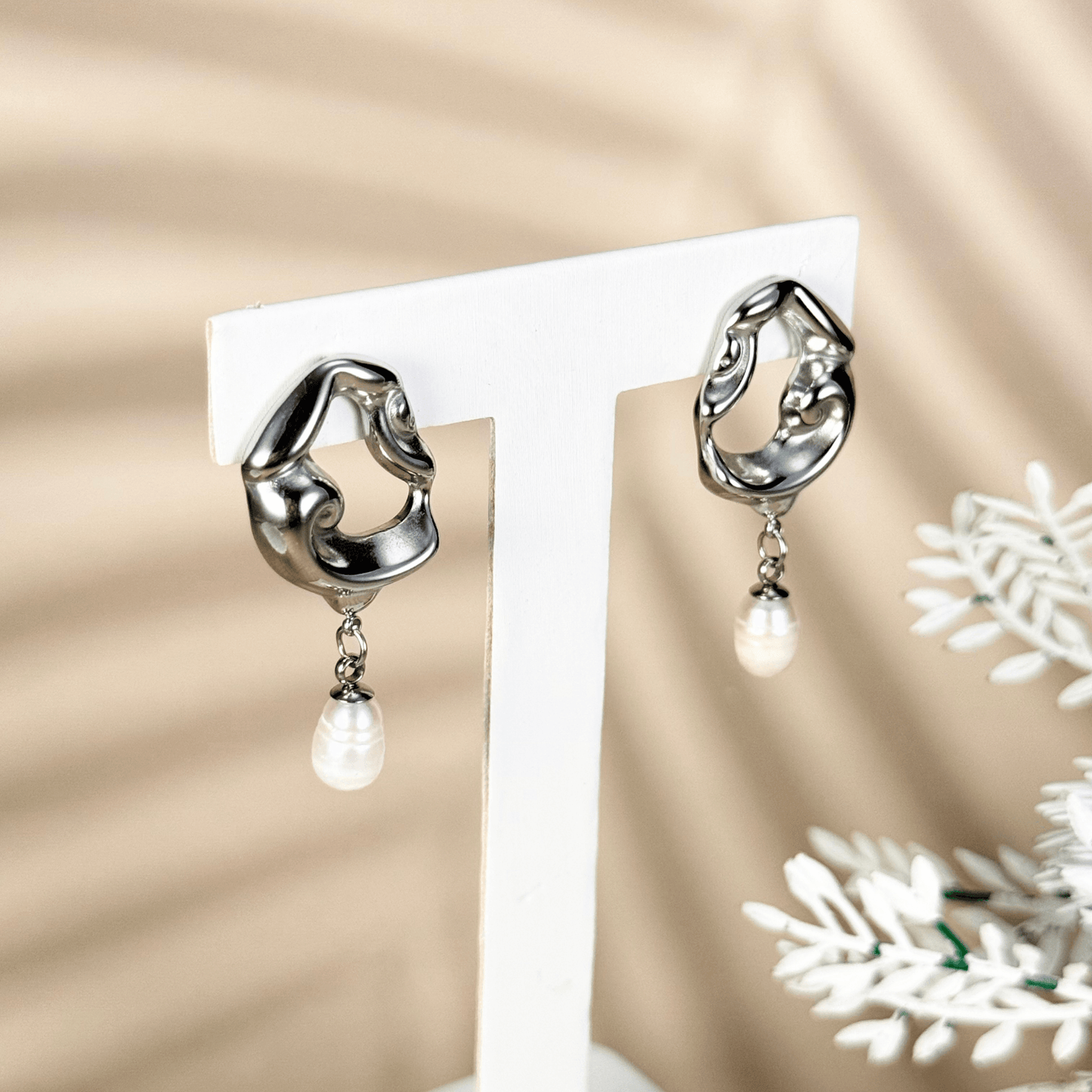 Sculpted gold and silver wave earrings with natural freshwater pearl drops – waterproof, tarnish-resistant minimalist jewellery by MXW Jewellery