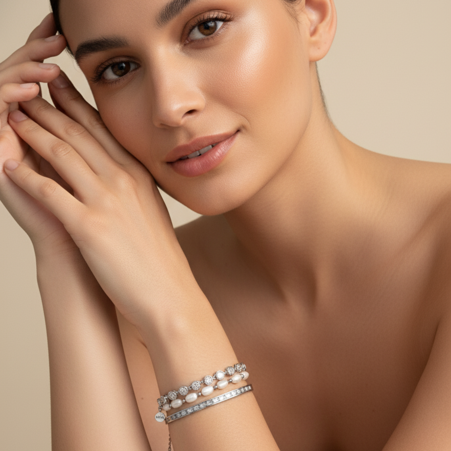 crystal tennis bracelet with bezel-set clear stones.