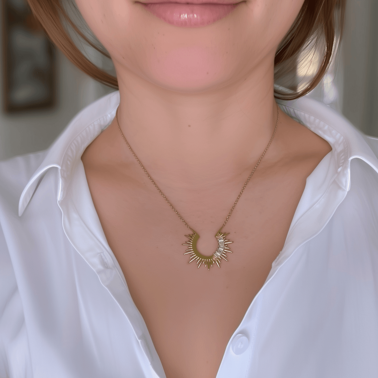 Waterproof sparkling sunburst necklace with a radiant crescent pendant in 18K PVD gold, accented with cubic zirconia
