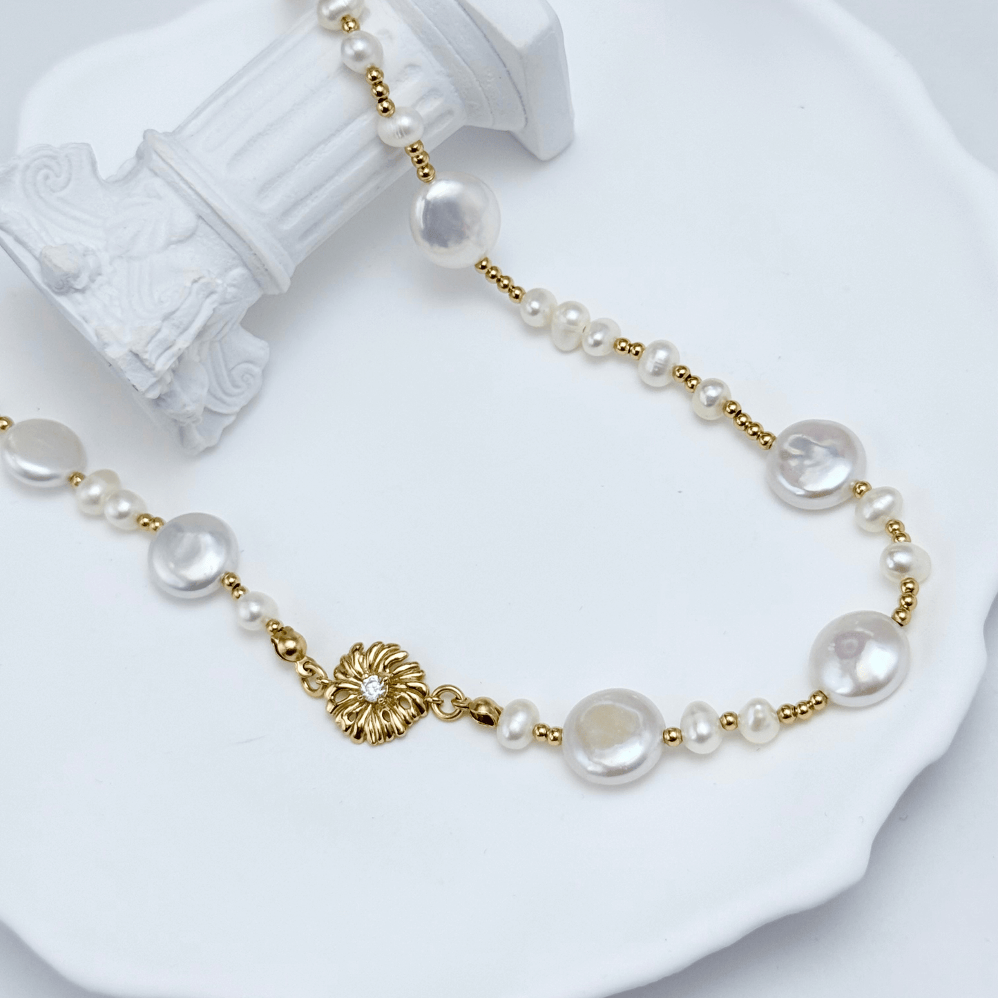 Gold and pearl sunburst necklace with baroque pearls and vintage-inspired design