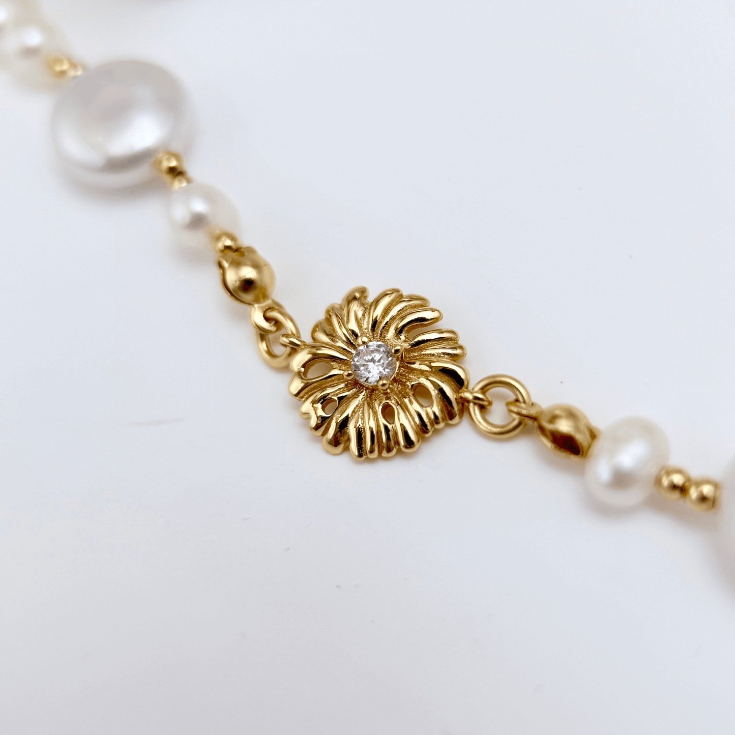 Gold and pearl sunburst necklace with baroque pearls and vintage-inspired design