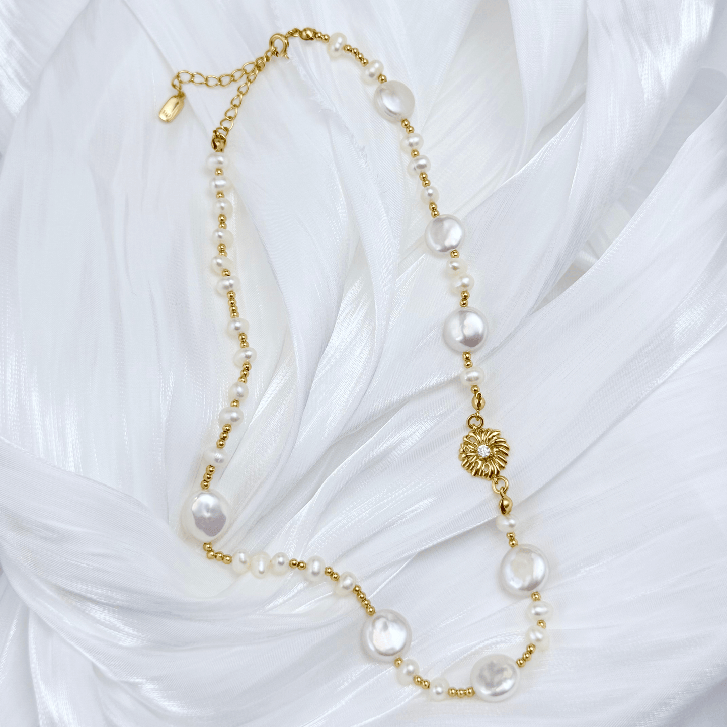 Gold and pearl sunburst necklace with baroque pearls and vintage-inspired design