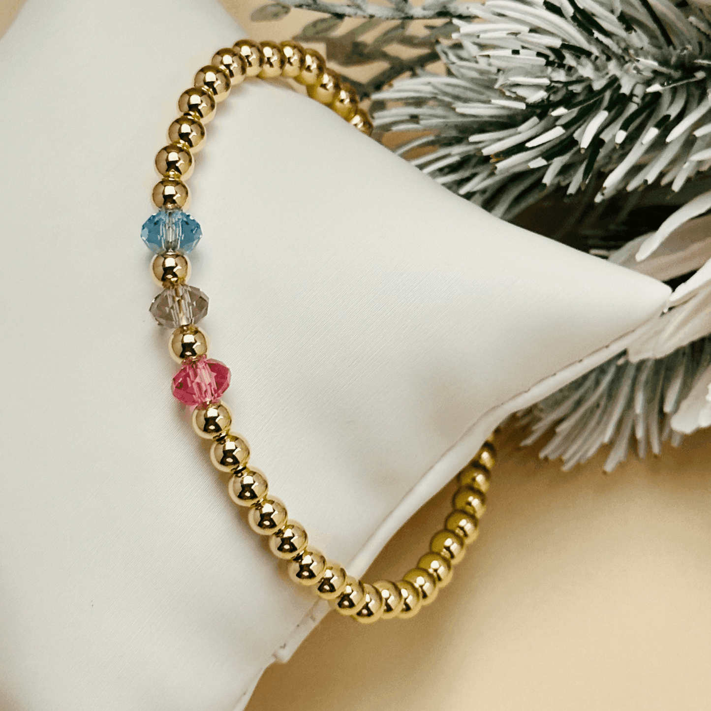 Personalised Swarovski birthstone beaded bracelet in gold-filled and sterling silver options, waterproof and customisable design by MXW Jewellery.