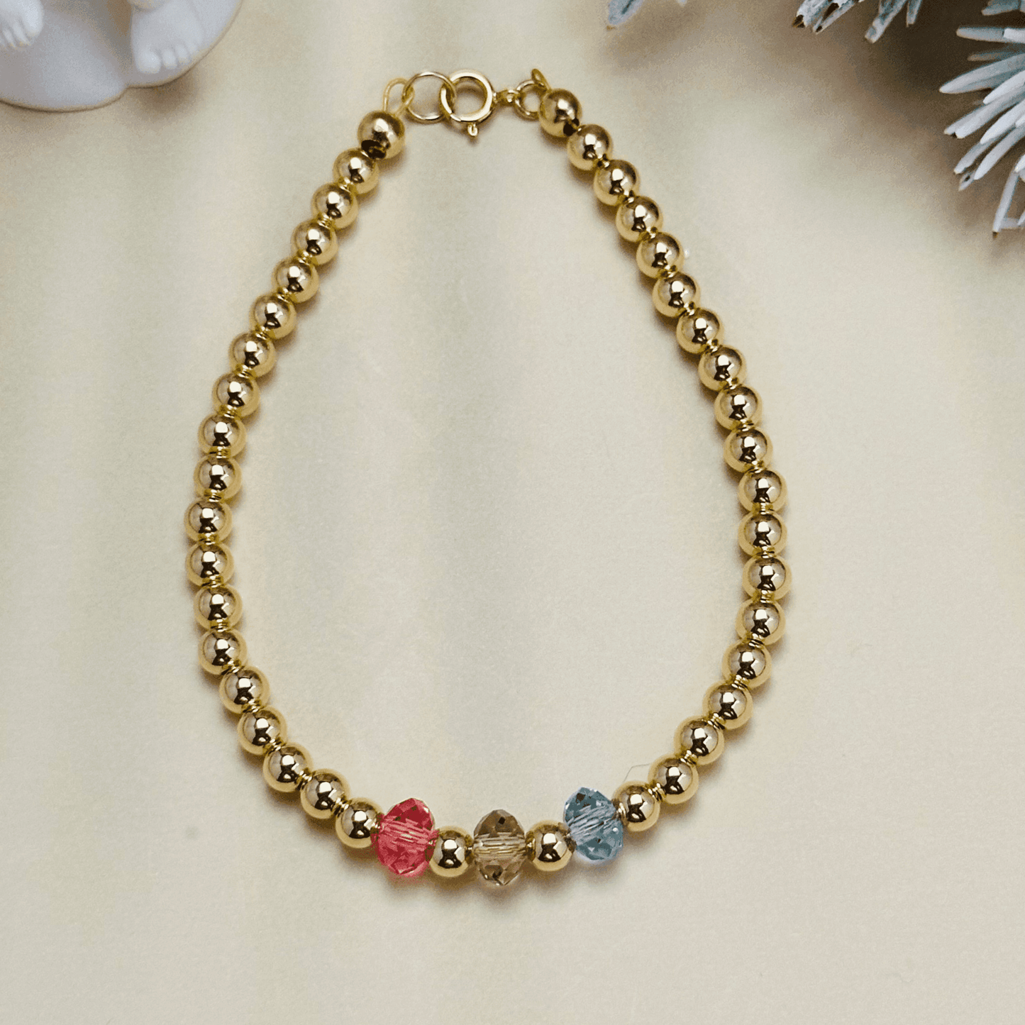 Personalised Swarovski birthstone beaded bracelet in gold-filled and sterling silver options, waterproof and customisable design by MXW Jewellery.