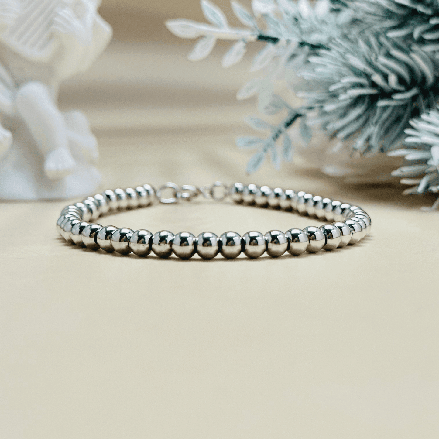 Personalised Swarovski birthstone beaded bracelet in gold-filled and sterling silver options, waterproof and customisable design by MXW Jewellery.