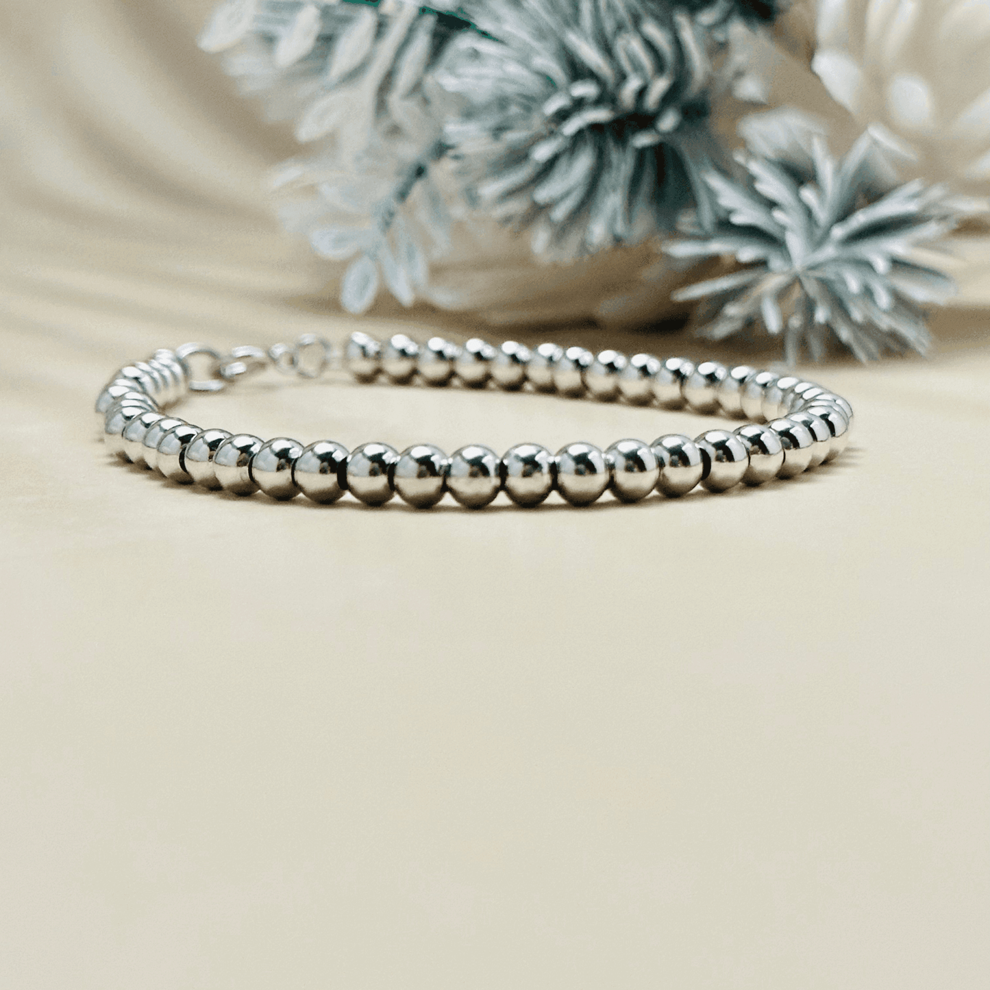 Personalised Swarovski birthstone beaded bracelet in gold-filled and sterling silver options, waterproof and customisable design by MXW Jewellery.