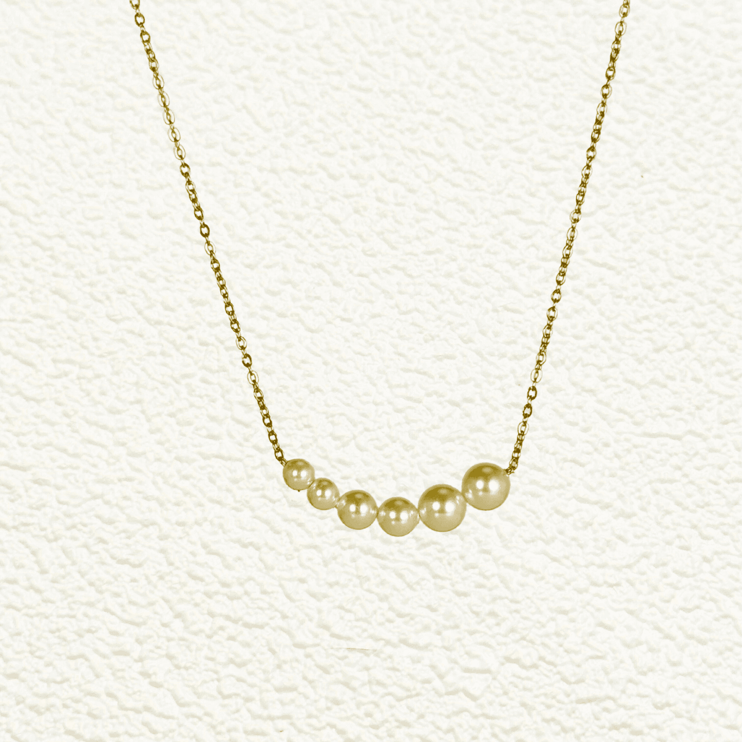 Tapered bar Swarovski crystal pearl necklace with gold and silver stainless steel chains, minimalist elegant design by MXW Jewellery.