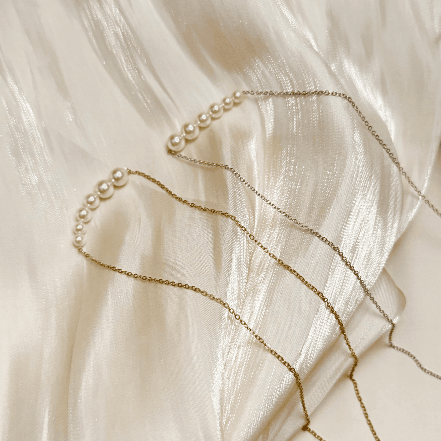 Tapered bar Swarovski crystal pearl necklace with gold and silver stainless steel chains, minimalist elegant design by MXW Jewellery.