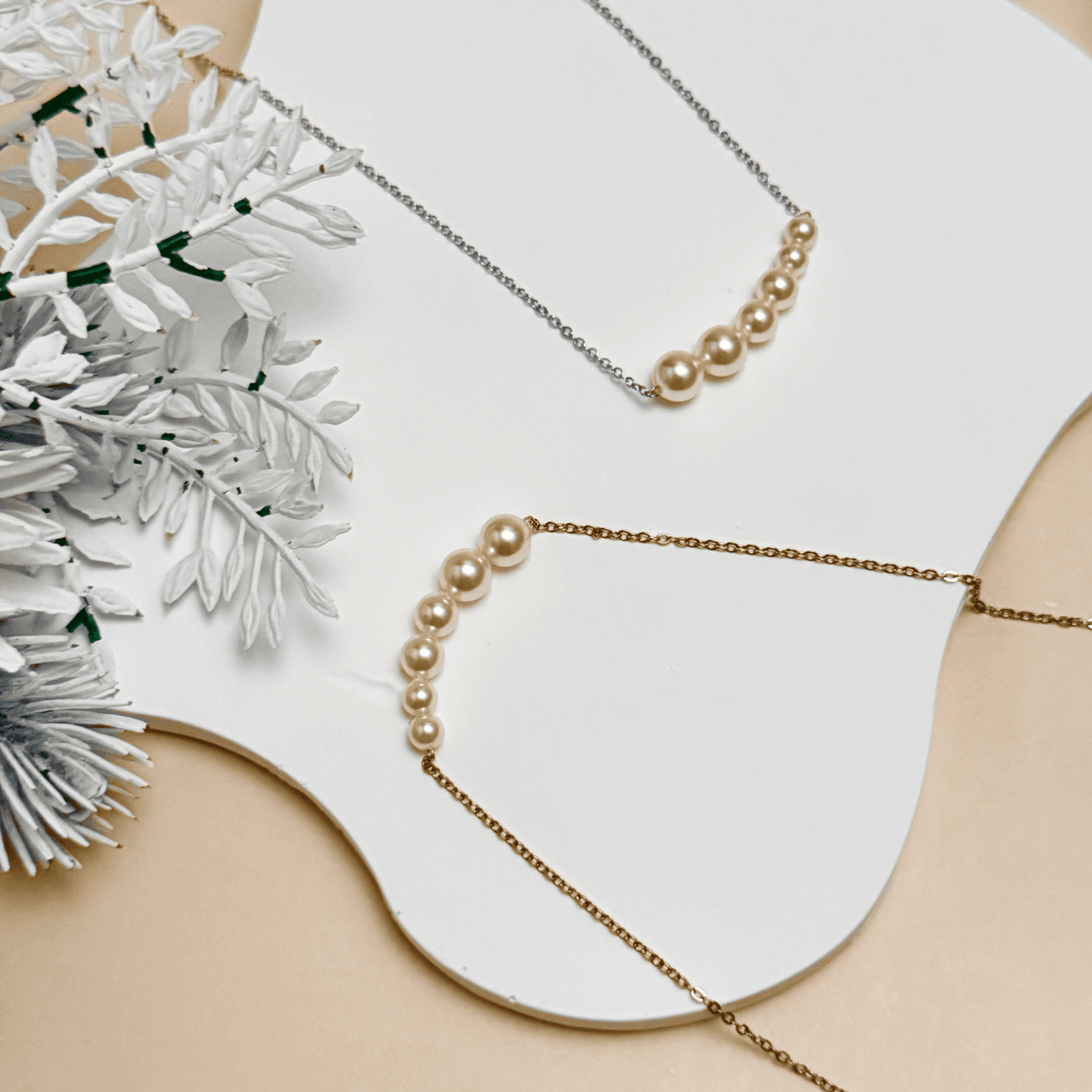 Tapered bar Swarovski crystal pearl necklace with gold and silver stainless steel chains, minimalist elegant design by MXW Jewellery.