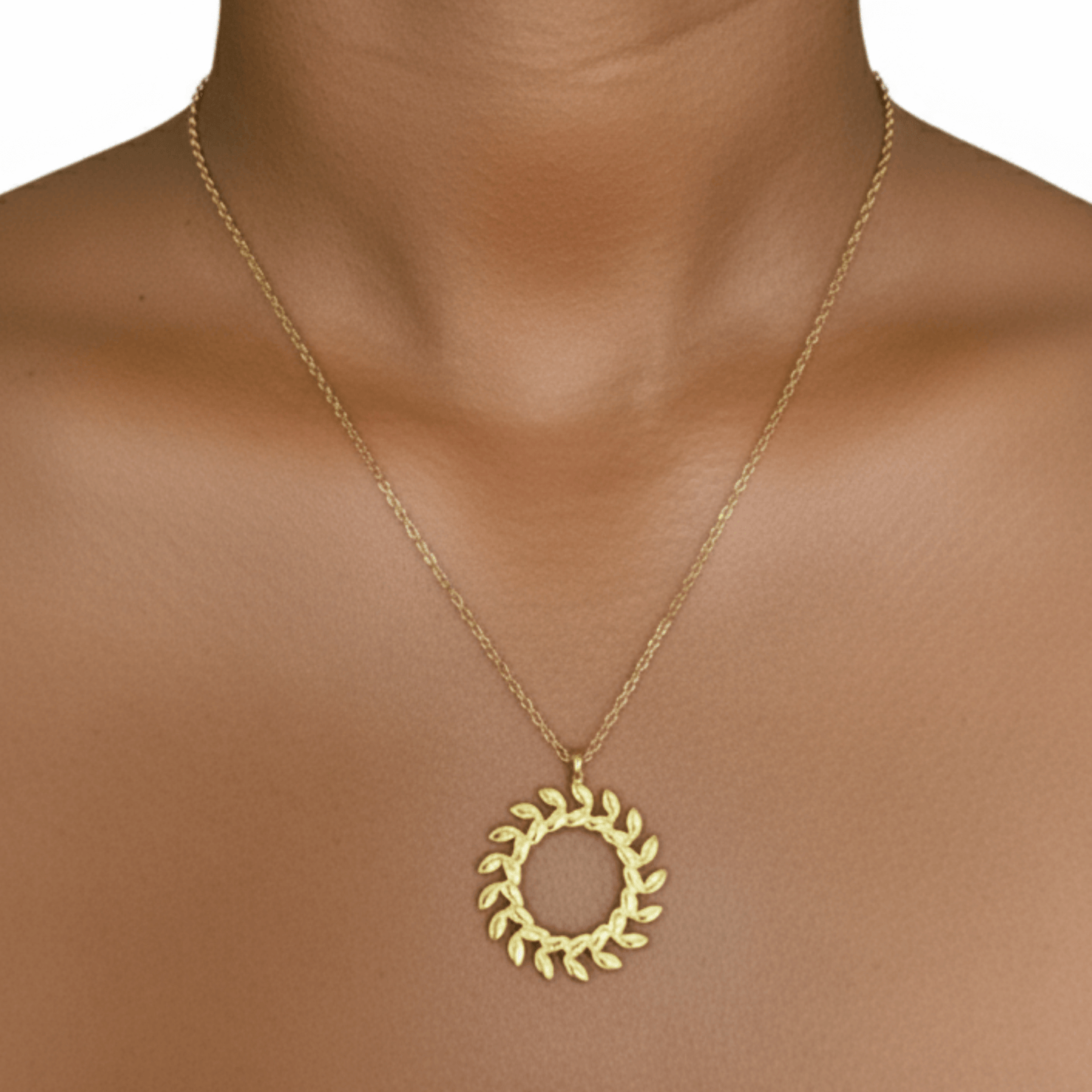 Gold laurel wreath necklace symbolising progress and resilience – MXW Jewellery
