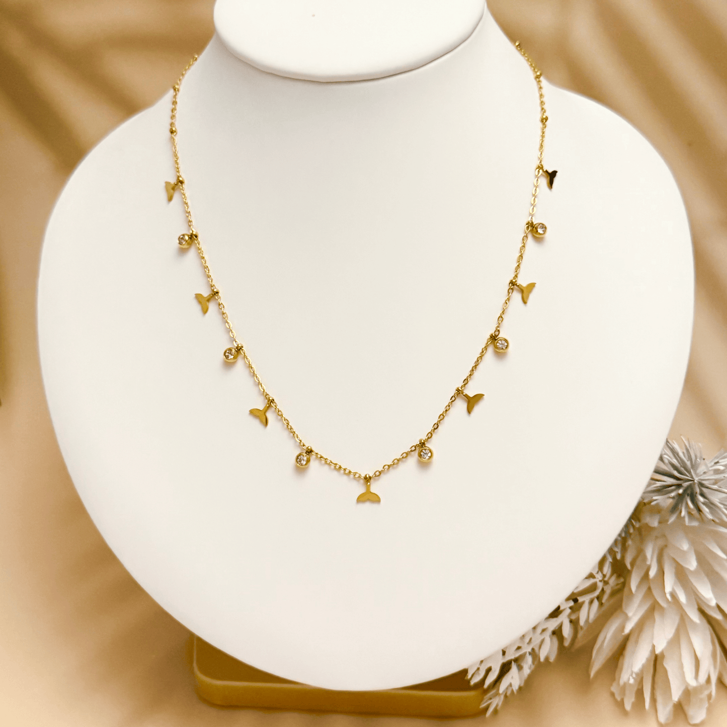 Gold whale tail charm necklace with zircon stones, waterproof and tarnish-resistant.