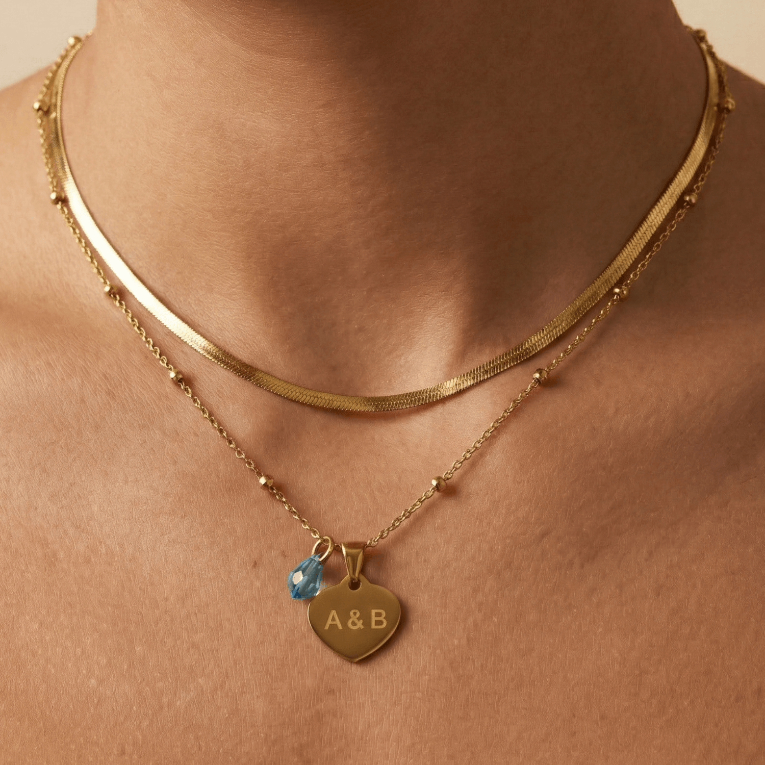 Engravable gold necklace handcrafted for self-expression, personalised with names or meaningful words, waterproof design.