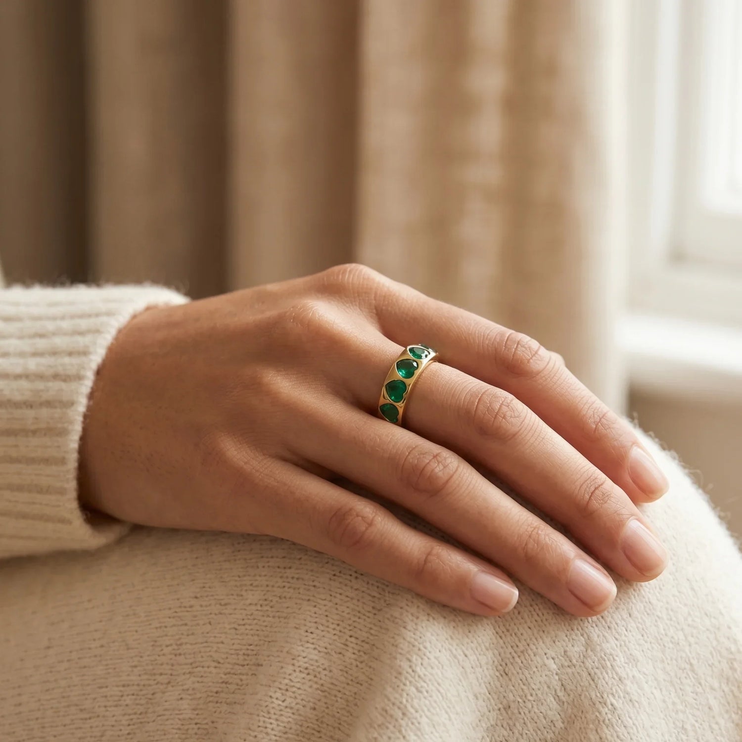 stylish gold rings from MXW Jewellery, including a bold flower design, organic texture band, and modern wave shape, perfect for a summer beach vibe.