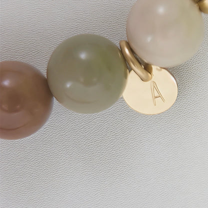 MXW Jewellery Personalised Alashan agate bracelet with freshwater pearl, gold-filled beads and a stamped initial disc.