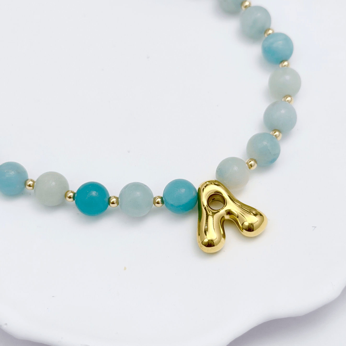 Amazonite beaded necklace with gold bubble initial pendant and gold filled spacer beads by MXW Jewellery