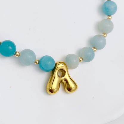 Amazonite beaded necklace with gold bubble initial pendant and gold filled spacer beads by MXW Jewellery