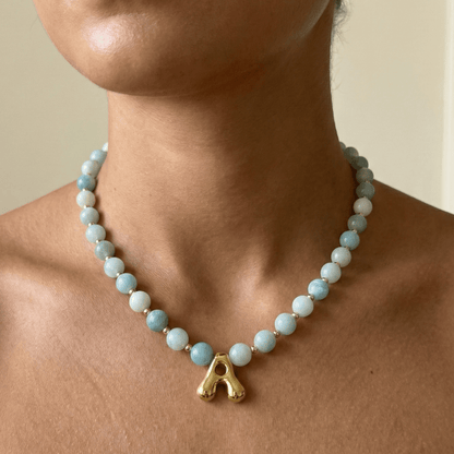 Amazonite beaded necklace with gold bubble initial pendant and gold filled spacer beads by MXW Jewellery