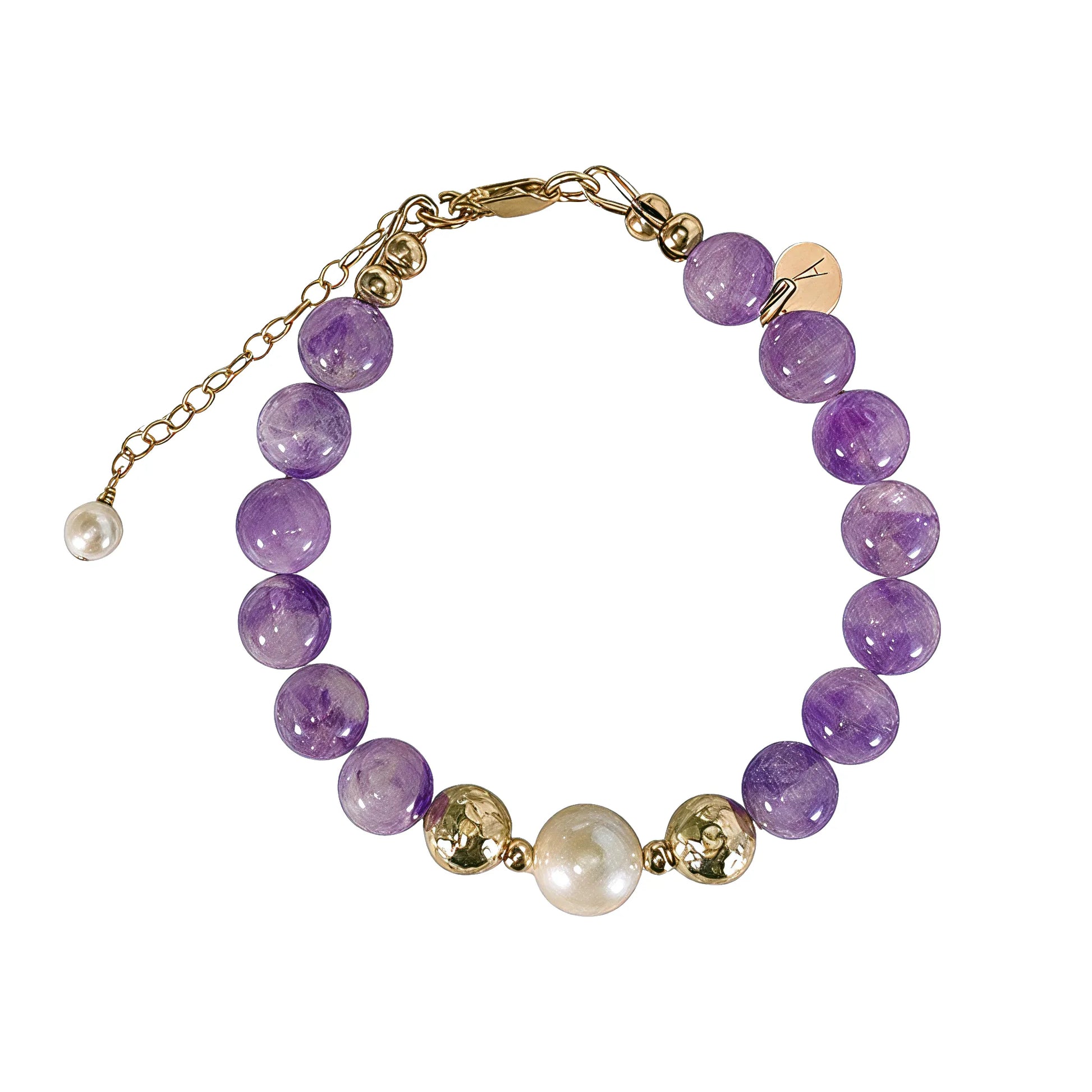 A beaded bracelet featuring Amethyst beads, premium freshwater pearl, and stamped initial disc, 14k gold filled. MXW Jewellery.