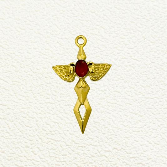 Gold sword-shaped charm featuring angel wings and a red gemstone center, blending strength and divinity.