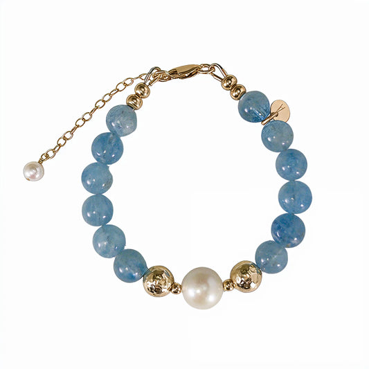 Aquamarine, pearl and initial gold bracelet featuring AAA-grade aquamarine beads, lustrous pearls and a personalised gold-filled stamped initial disc.