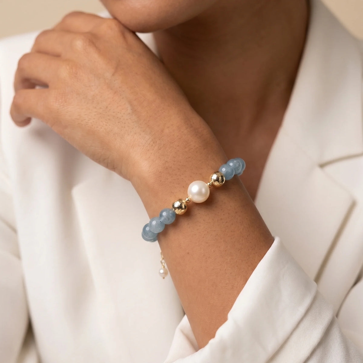 Aquamarine, pearl and initial gold bracelet featuring AAA-grade aquamarine beads, lustrous pearls and a personalised gold-filled stamped initial disc.