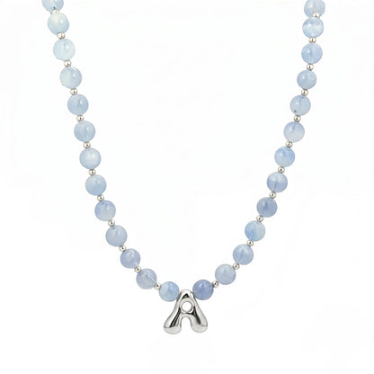 Aquamarine Silver Bubble Initial Necklace with natural aquamarine beads, sterling silver accents and personalised silver initial charm – MXW Jewellery