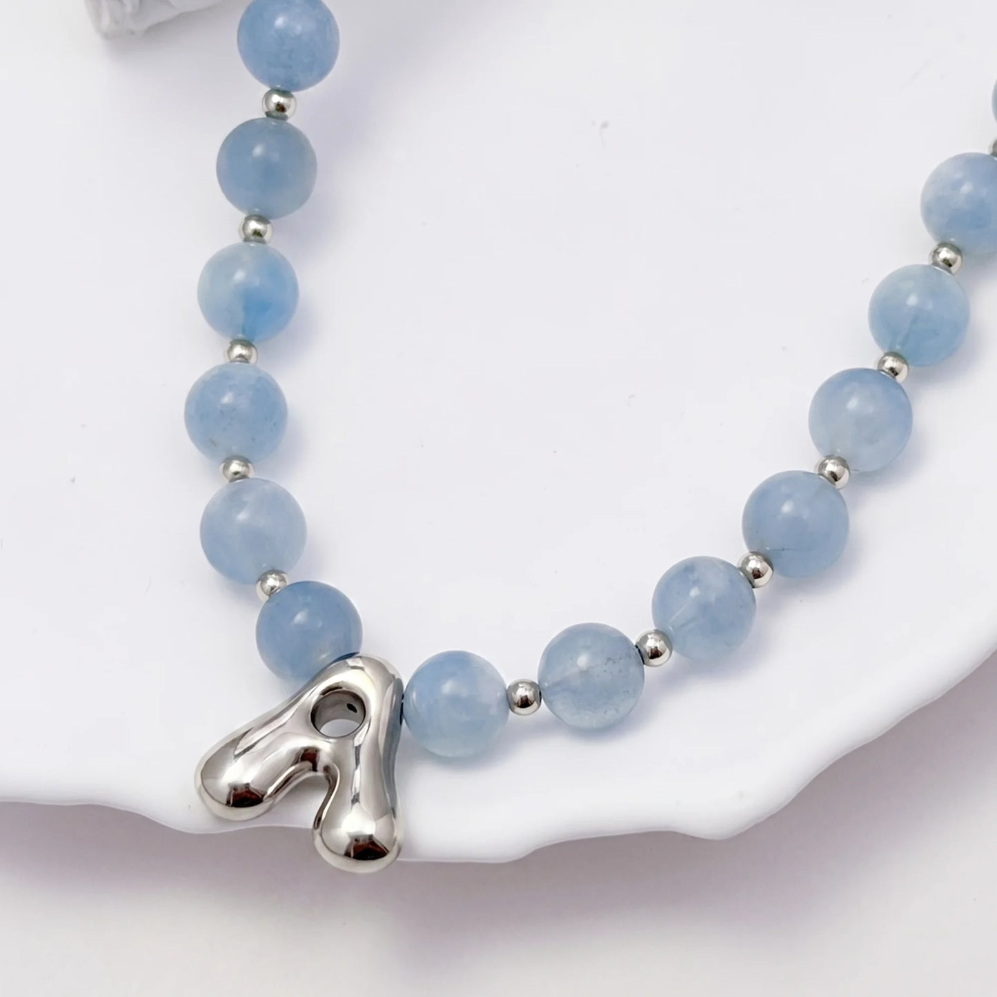 Aquamarine Silver Bubble Initial Necklace with natural aquamarine beads, sterling silver accents and personalised silver initial charm – MXW Jewellery