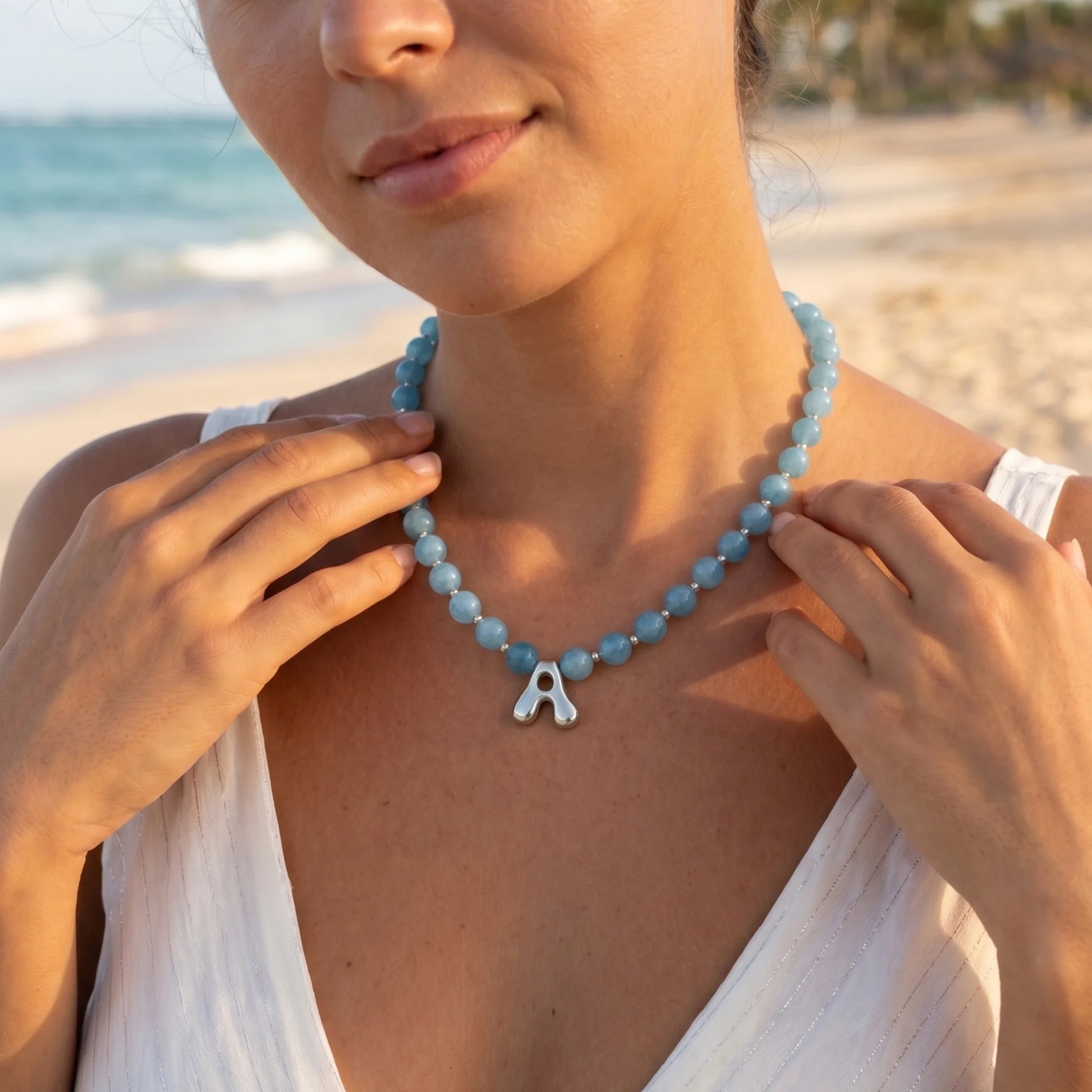 Aquamarine Silver Bubble Initial Necklace with natural aquamarine beads, sterling silver accents and personalised silver initial charm – MXW Jewellery