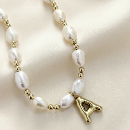 Premium baroque freshwater pearl and 14K gold filled beaded necklace with personalised gold bubble initial charm, hand-finished in Australia