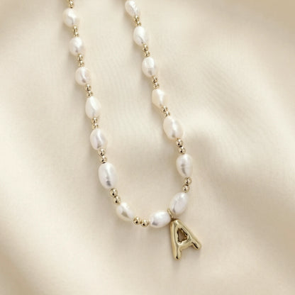 Premium baroque freshwater pearl and 14K gold filled beaded necklace with personalised gold bubble initial charm, hand-finished in Australia