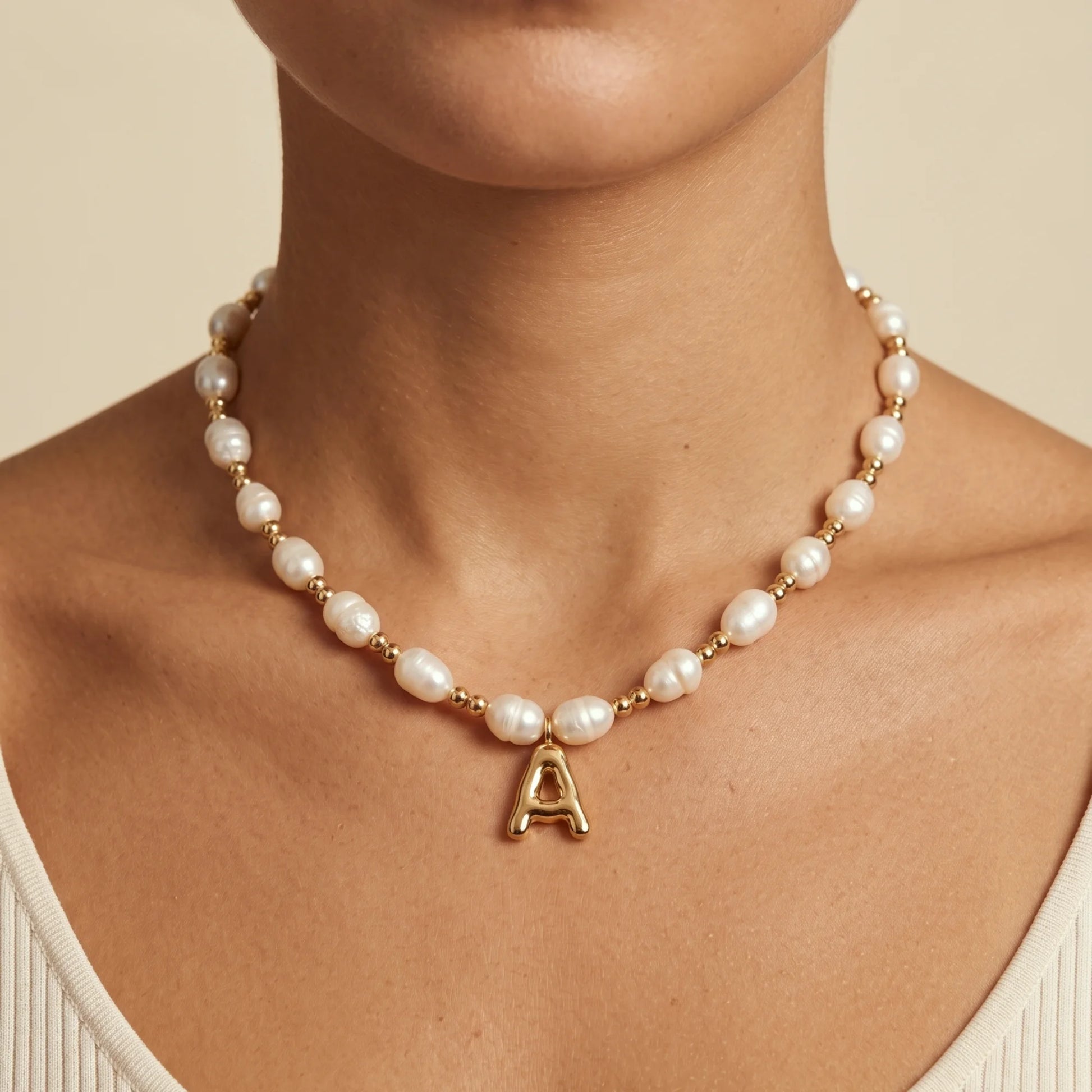 Premium baroque freshwater pearl and 14K gold filled beaded necklace with personalised gold bubble initial charm, hand-finished in Australia